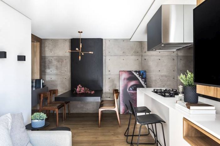 Neste apartamento de 72 m², a parede que dividia a cozinha e sala de jantar foi abaixo, facilitando a circulação e trazendo maior amplitude. Projeto: UNIC Arquitetura - Fotos: Eduardo Macarios Neste apartamento de 72 m², a parede que dividia a cozinha e sala de jantar foi abaixo, facilitando a circulação e trazendo maior amplitude. Projeto: UNIC Arquitetura - Fotos: Eduardo Macarios
